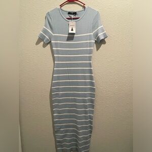Light blue form fitting maxi dress. Medium with stretch.
